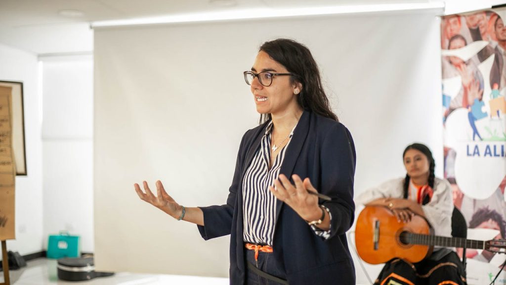 Woman in Suit Speaking